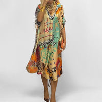 Dylan | Comfortable And Vibrant graphic print swing tunic dress